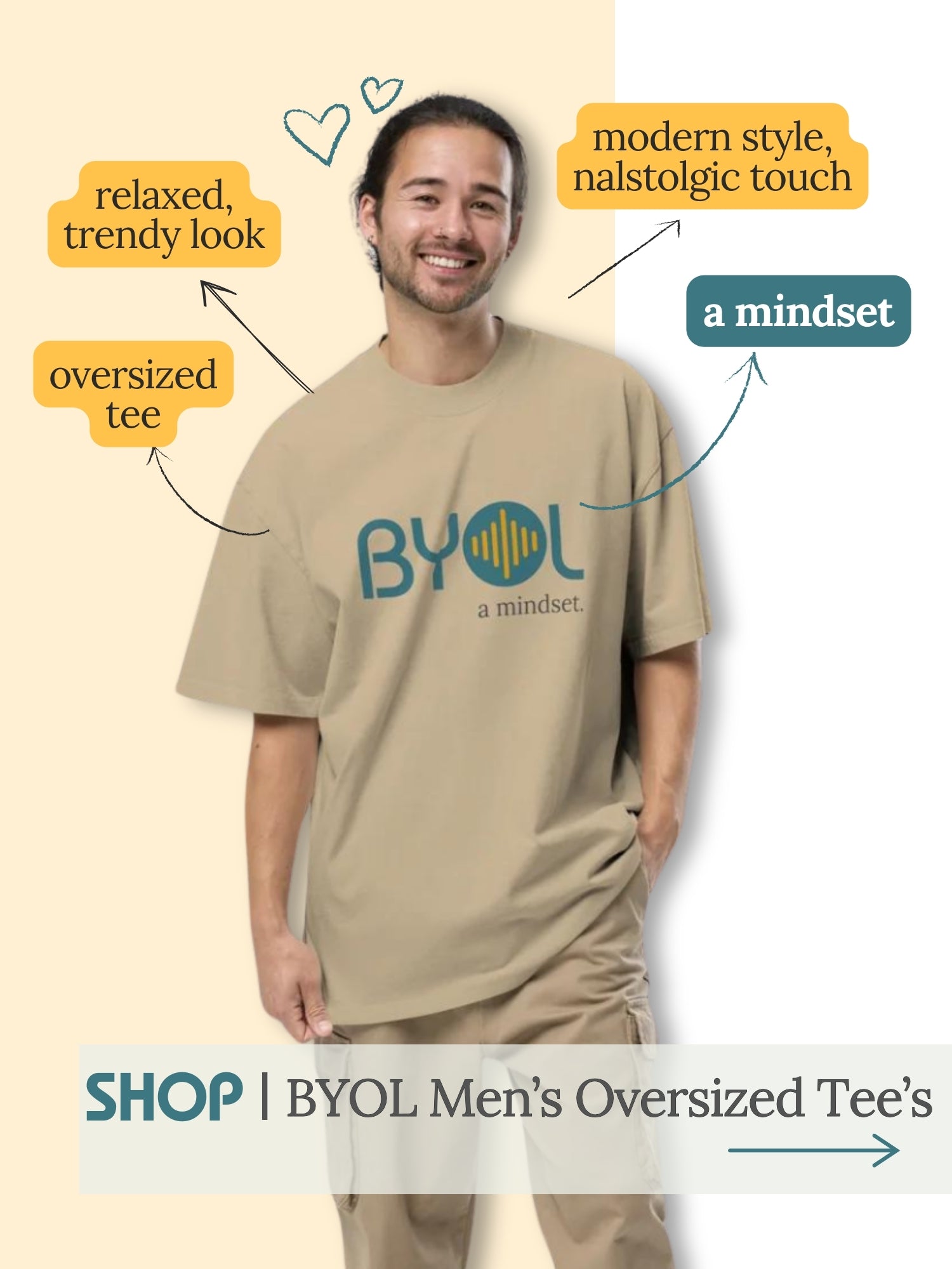 Smiling man wearing a beige oversized Be You Out Loud T-shirt with logo, standing confidently, representing a casual and relaxed style that encourages self-expression and authenticity.