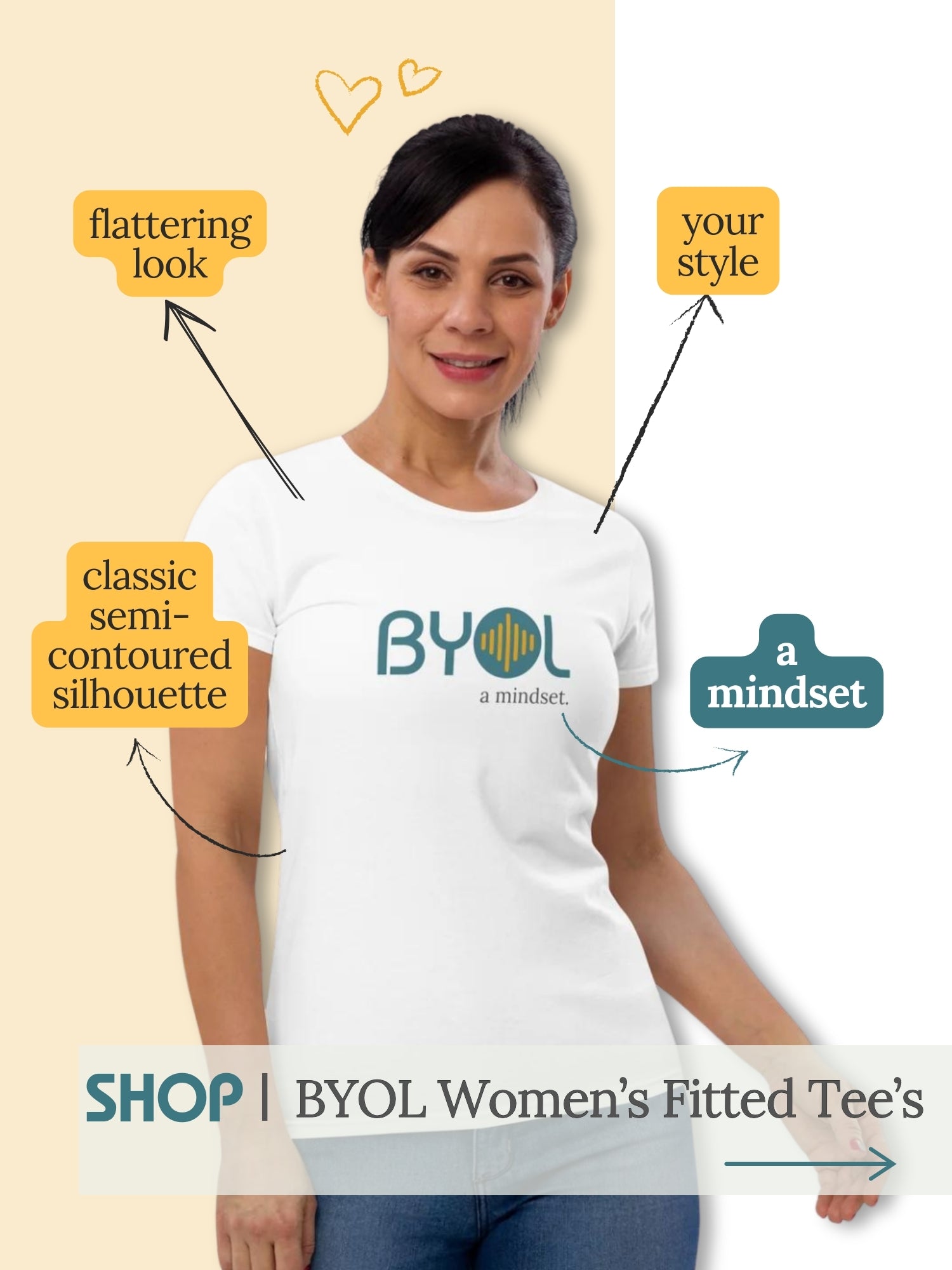 Woman in a white Be You Out Loud fitted t-shirt, smiling and adjusting her ponytail, paired with jeans. The shirt showcases the BYOL logo. Emphasizes a confident, stylish mindset.