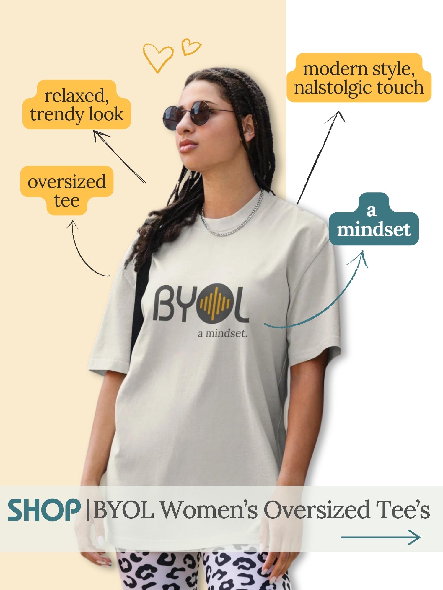 Woman wearing sunglasses and an oversized faded black t-shirt with "BYOL: a mindset" logo, highlighting individuality and self-expression. The t-shirt is perfect for those who embrace their unique style and voice.