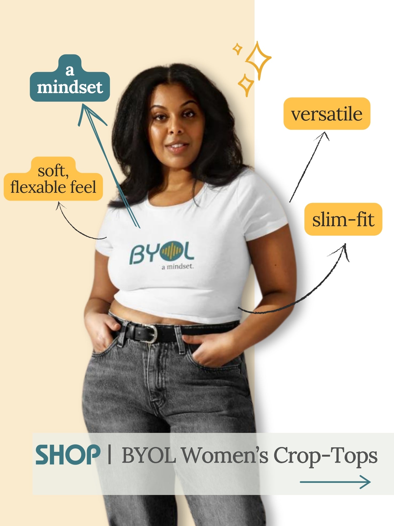 Woman in a Be You Out Loud white crop top paired with a black denim jeans, smiling. The top features a central logo. Styled to emphasize the BYOL mindset.