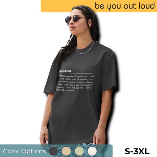 Confident woman sporting Be You Out Loud's charcoal "Quirky Ingredients" oversized T-shirt, featuring a creative list-style graphic. Available in sizes S-3XL with various color options, this tee is perfect for those who love a blend of humor and style.