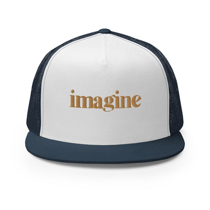 A sleek white and navy blue 5-panel trucker cap with "imagine" elegantly scripted in gold on the front, featuring a breathable mesh back and a customizable snapback closure, perfect for creatives and thinkers alike.