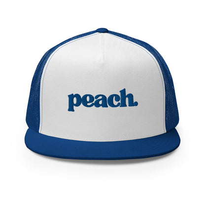 A white and royal blue 5-panel trucker cap with "peach" written in striking blue script across the front, featuring breathable mesh backing and a classic snapback closure.