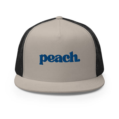 A khaki and black 5-panel trucker cap with "peach" written in striking blue script across the front, featuring breathable mesh backing and a classic snapback closure.