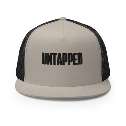 A sophisticated khaki and black 5-panel trucker cap with embossed "UNTAPPED" lettering on the front, featuring a mesh back for breathability and an adjustable snapback closure for the perfect fit.