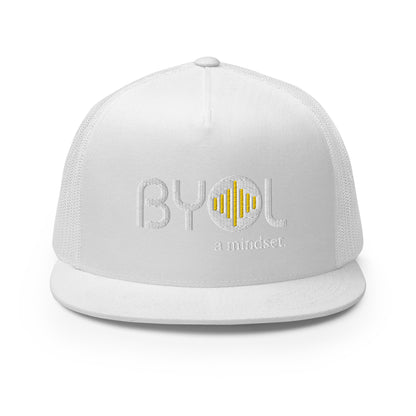 White blue 5-panel trucker hat with "BYOL a mindset" embroidered on the front in white and yellow, displayed against a clean background. Available in various colors: gray, maroon, white and blue, blue, and teal.