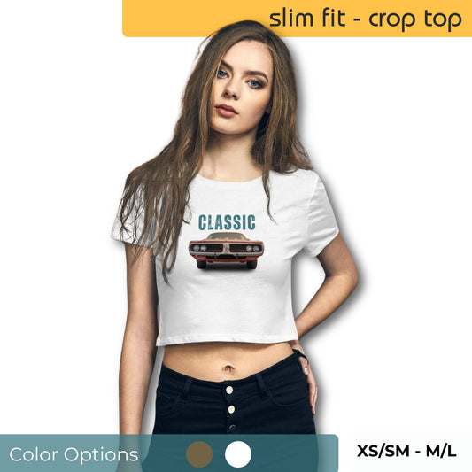 Stylish woman in a white slim-fit crop top featuring a 'CLASSIC' slogan above a vintage car graphic, paired with high-rise black jeans, with size and color options visible.