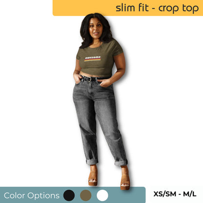 Woman models a slim fit olive green crop top with 'awesome' print, paired with cuffed grey jeans and brown heels, available in XS/SM to M/L, with color swatches displayed.