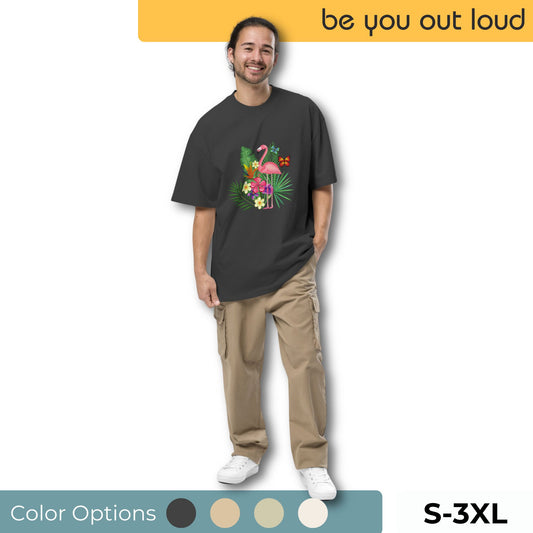 Happy man sporting a black tropical floral print t-shirt with a colorful parrot and lush foliage design, paired with khaki cargo trousers and white sneakers. Offered in various color options and sizes ranging from S to 3XL.