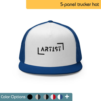 White trucker hat with the word "ARTIST" embroidered in a rainbow gradient across the front. The brim is blue. Text "5-Panel Trucker Hat" is written above the image, and "Color Options+" is written below the image. There are also swatches showing multiple color options.