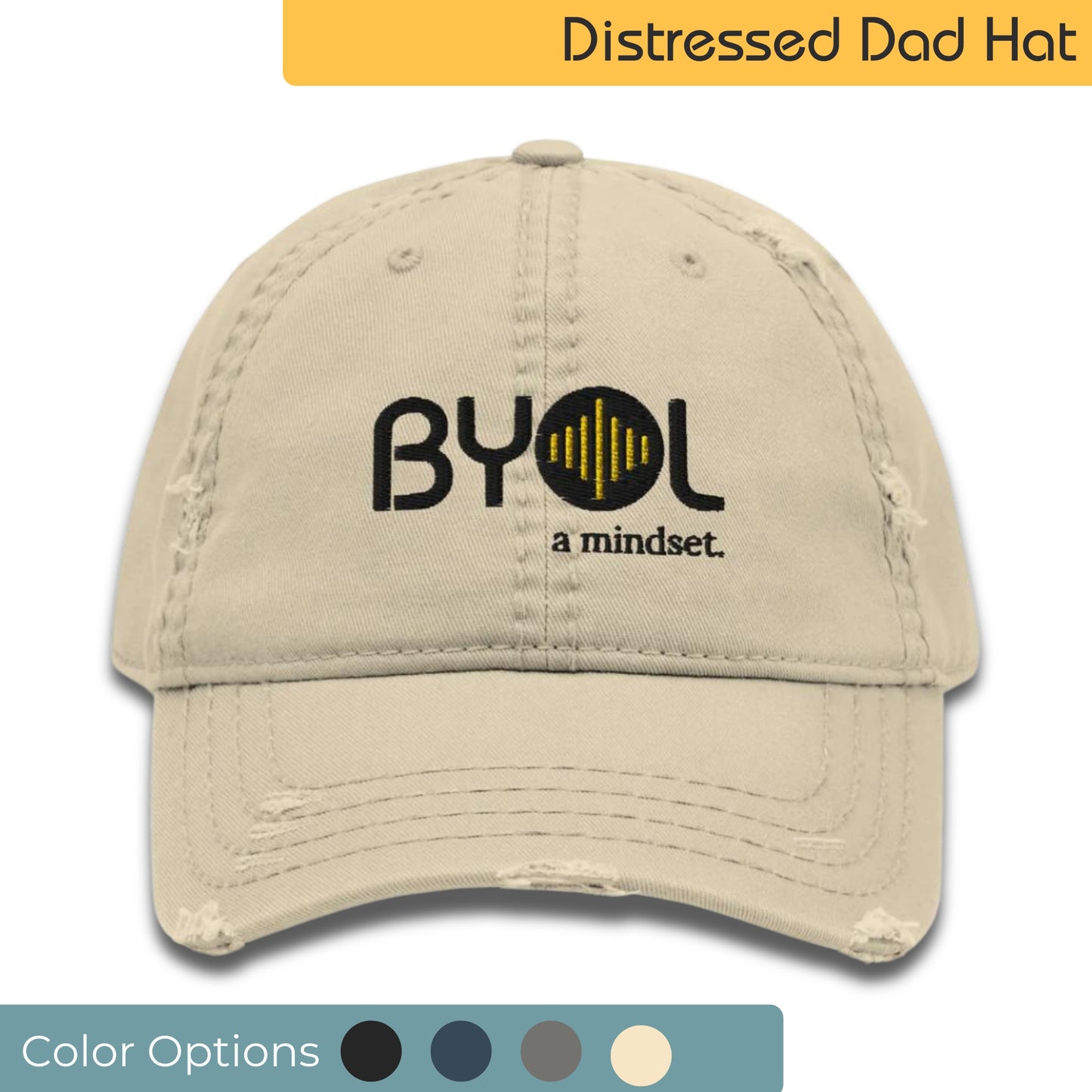 Khaki distressed dad hat with "BYOL a mindset" embroidered on the front in black and yellow, displayed against a clean background. Available in various colors: black, navy blue, gray, green, and beige.