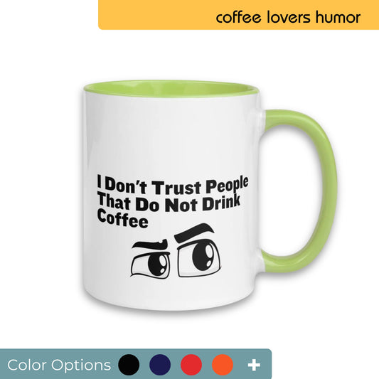 White coffee mug with a light green handle and interior, featuring the humorous quote "I Don't Trust People That Do Not Drink Coffee" with cartoon eyes, perfect for coffee lovers, displayed with various color customization options.