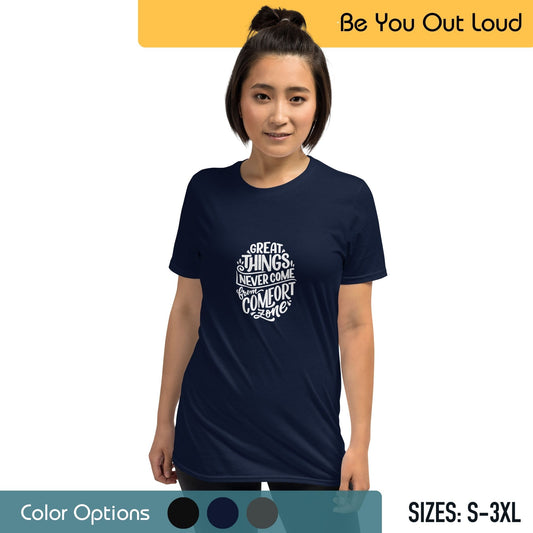 A woman with her hair in a top knot wearing a navy blue T-shirt that reads "Great things never come from comfort zone," standing in front of a background with the text "Be You Out Loud" and a color options palette, with T-shirt sizes from S to 3XL listed.