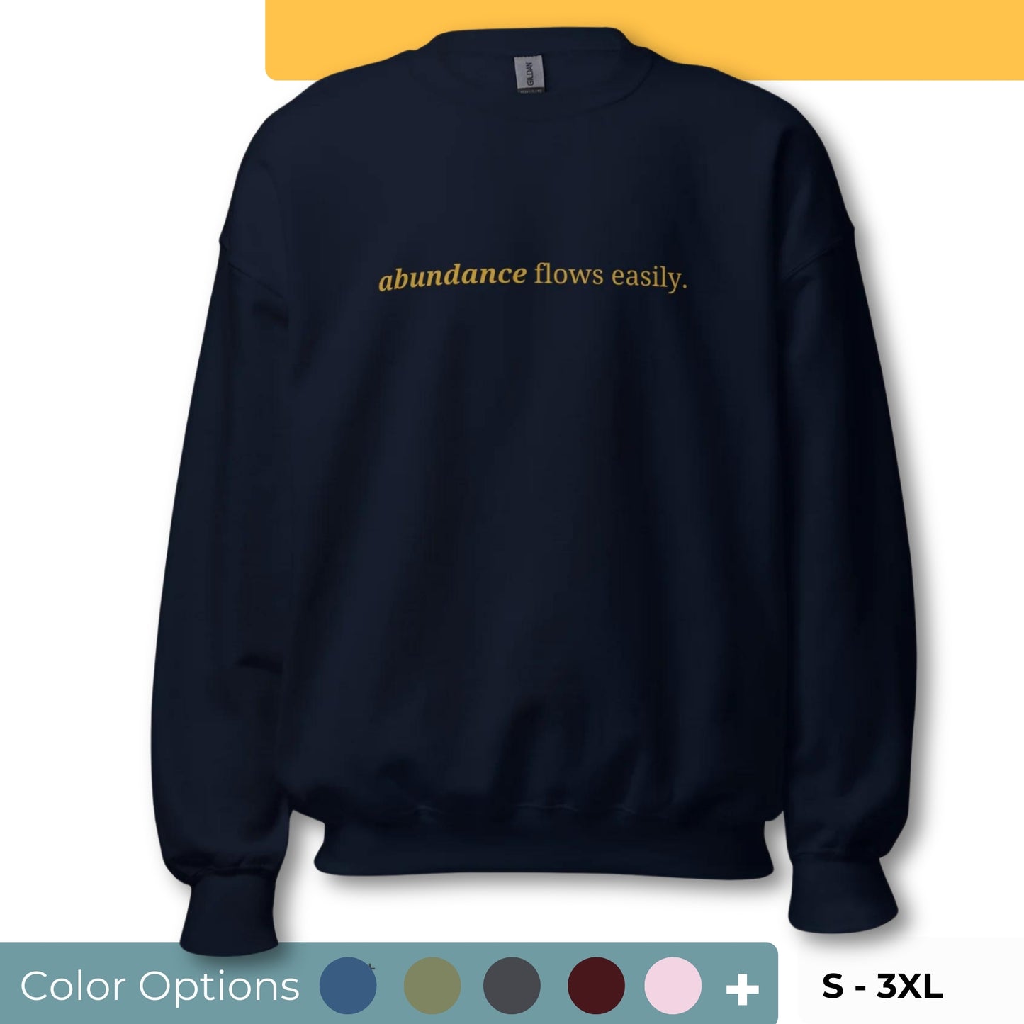 Navy blue sweatshirt with the phrase "abundance flows easily." printed on the front, available in color options navy blue, green, maroon, gray, and pink, available in sizes S to 3XL.