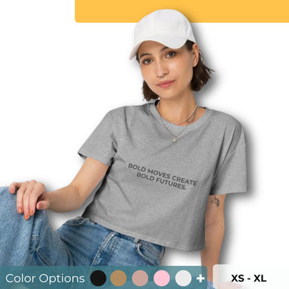 Women’s Loose-Fit Crop Top with "Bold moves create bold futures" slogan in various colors and sizes, XS to XL.