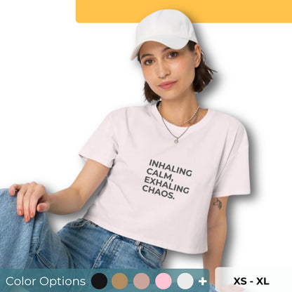 Women’s Loose-Fit Crop Top with "Inhaling calm, exhaling chaos" slogan in various colors and sizes, XS to XL.