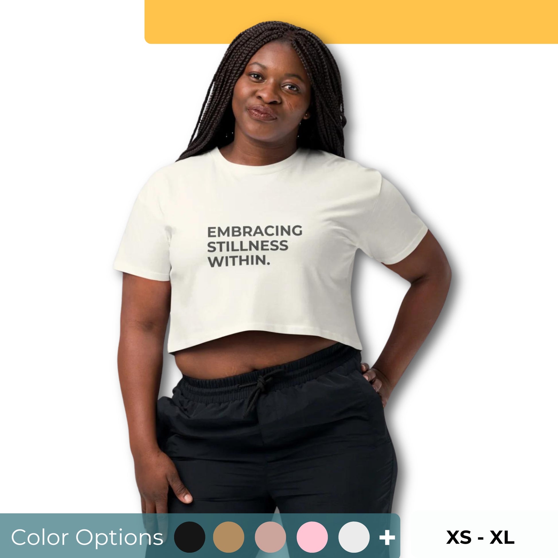 Women’s Loose-Fit Crop Top with "Embracing stillness within" slogan in various colors and sizes, XS to XL.