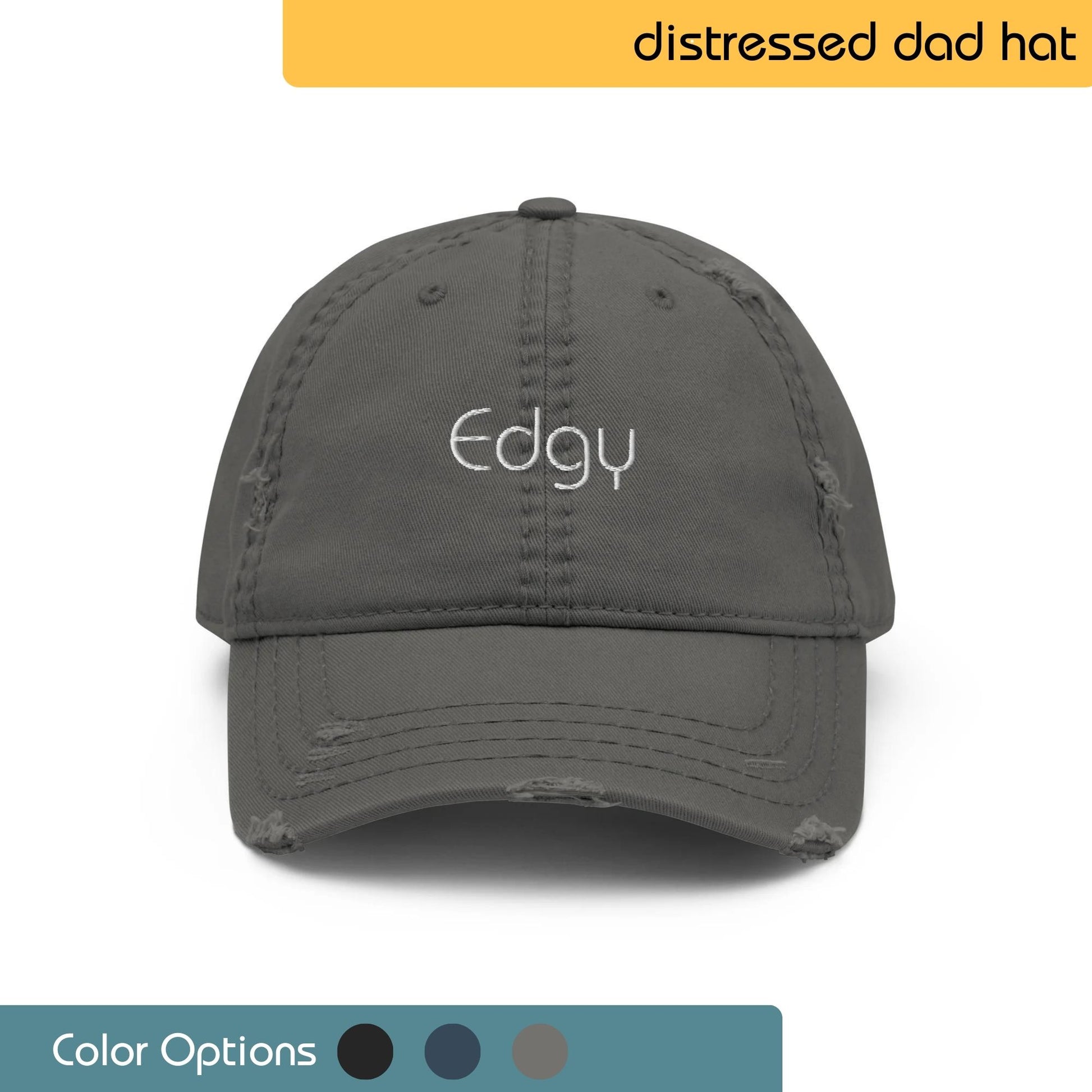 Gray distressed baseball cap with the word "WANDER" embroidered in white on the front. Text "Distressed Dad Hat" is written above the image. There are also swatches showing multiple color options.