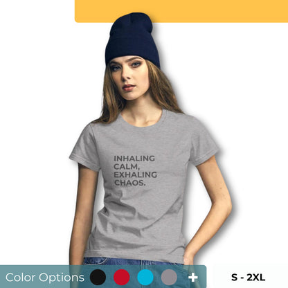 Women’s fitted tee with the text "Inhaling Calm, Exhaling Chaos" in multiple colors and sizes S-2XL.