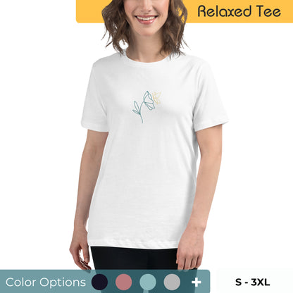 Woman wearing a relaxed tee with a minimalist flower graphic design, embodying comfortable and authentic fashion by BYOL. Showing that there is multiple color and size options