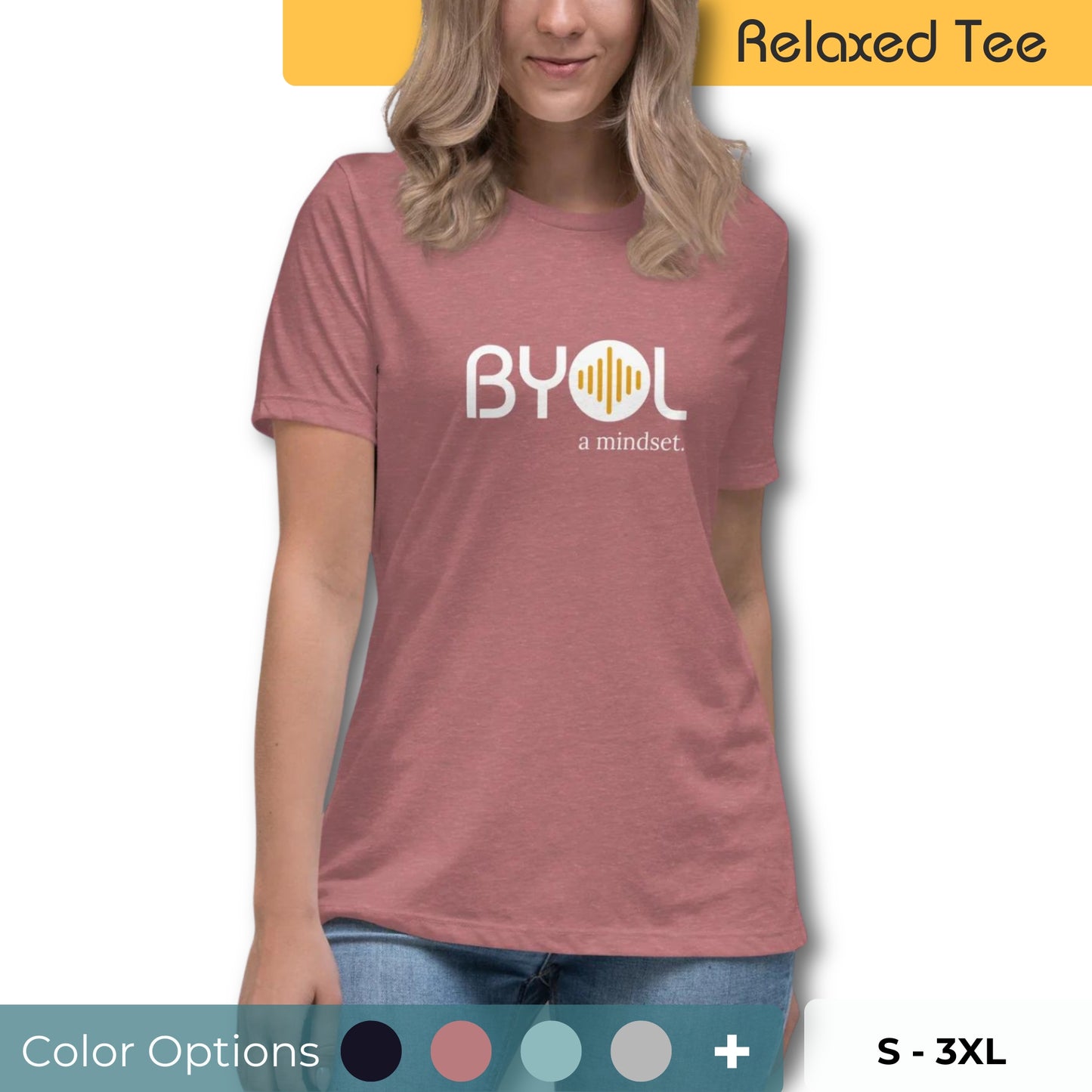 Woman wearing a relaxed fit BYOL mindset t-shirt in pink with color options in black, pink, blue, and gray, available in sizes S to 3XL.