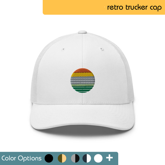 White trucker hat with a customizable rainbow circle embroidered on the front. Shown in white with a rainbow design, but available in various colors. Text "retro trucker cap" is written above the image.