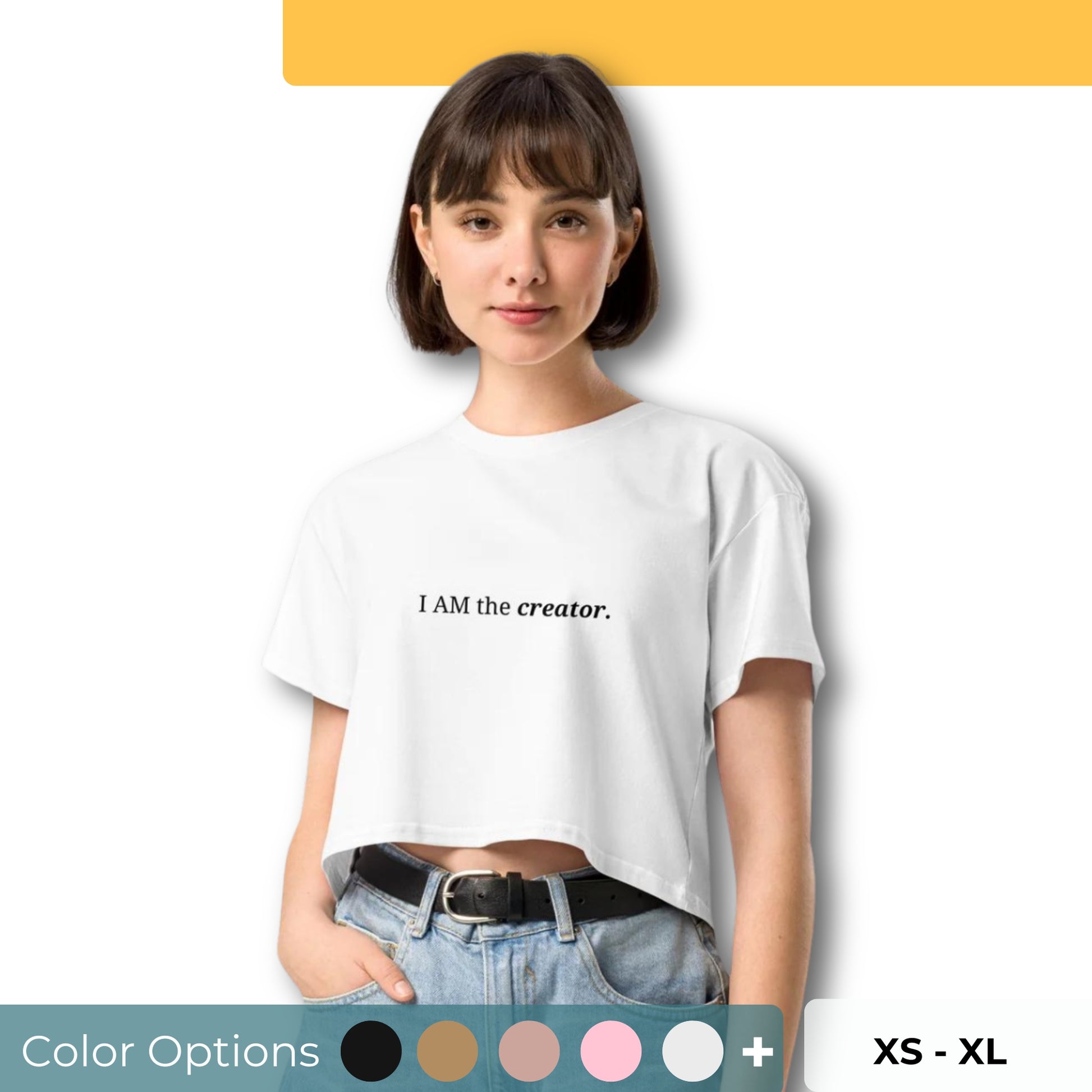 Woman wearing a white cropped t-shirt with the phrase "high vibration" printed in black, smiling and posing against a clean background. Available in various colors: black, brown, pink, green, and white. Sizes range from XS to XL.