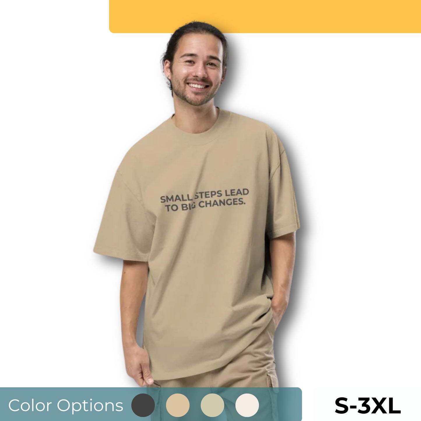 Man wearing an oversized faded tee in beige with "Small Steps Lead to Big Changes" text. Available in multiple colors and sizes S-3XL.