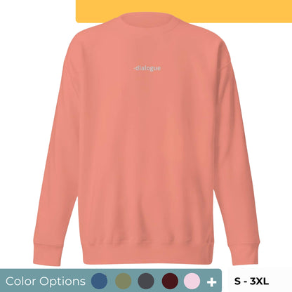 Dusty rose embroidered "Dialogue" premium crew neck sweatshirt with ribbed cuffs, soft fleece lining, and long sleeves, available in various colors and sizes.