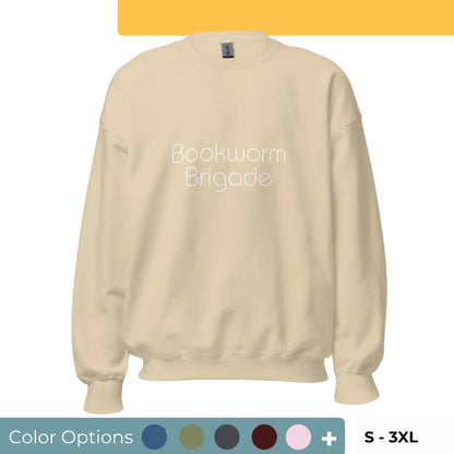 Sand "Bookworm Brigade" premium crew neck sweatshirt with ribbed cuffs, soft fleece lining, and comfortable fit, available in multiple colors and sizes.