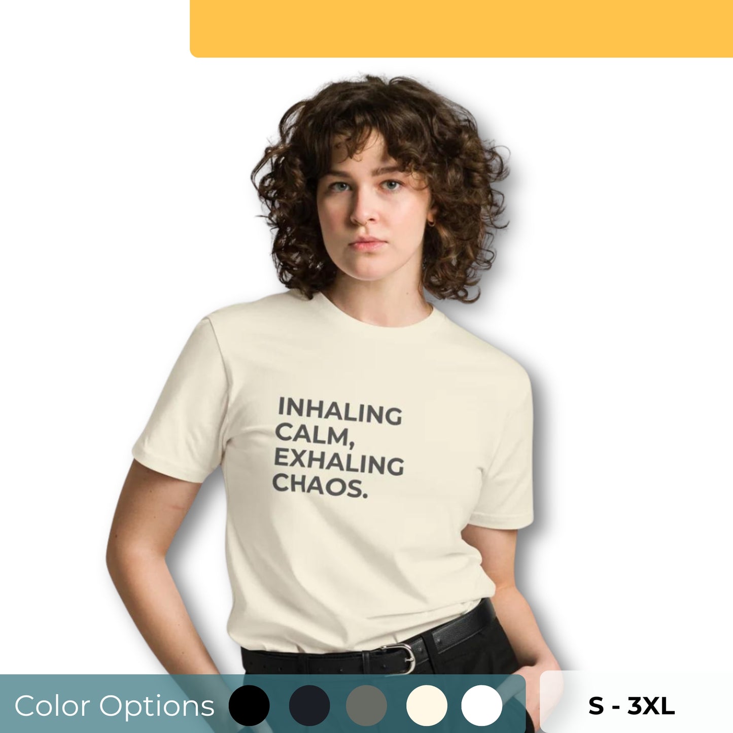 Woman wearing a light beige premium tee with "Inhaling Calm, Exhaling Chaos" text, available in multiple colors and sizes S-3XL.