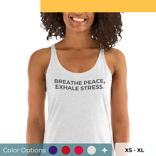 Smiling woman in a light grey racer back tank with "Breathe Peace, Exhale Stress" text, available in multiple colors and sizes.