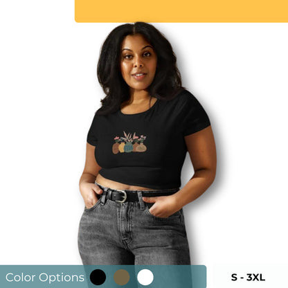 A woman wearing a slim fit crop top with a botanical vases design. Available in various colors and sizes S-3XL.A woman in a slim fit crop top with a retro flowers design. Available in multiple colors and sizes S-3XL.