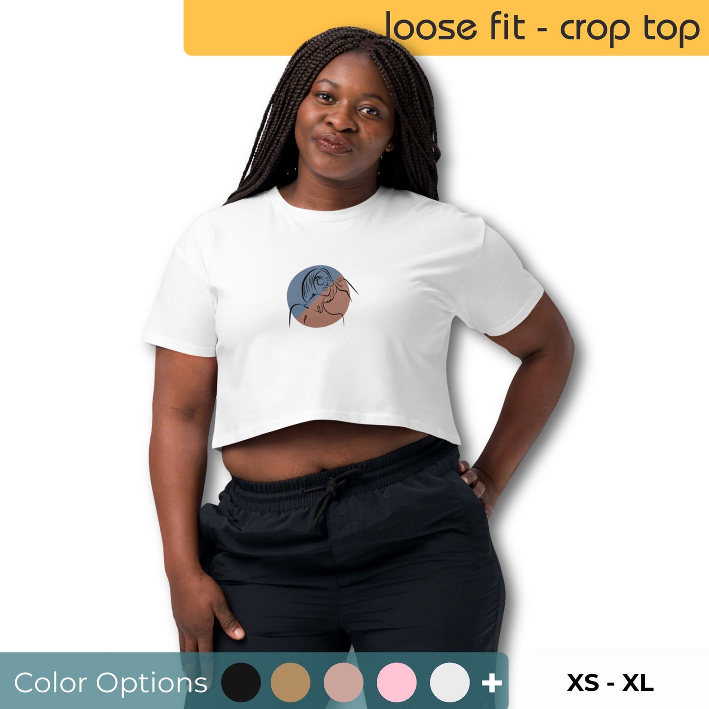 Woman wearing a loose-fit crop top with a minimalist portrait graphic design, embodying comfortable and authentic fashion by BYOL. Showing color and size options