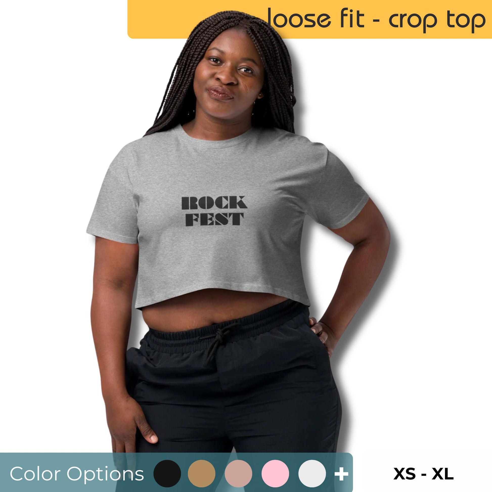 Woman wearing a gray loose-fit crop top with 'ROCK FEST' text, available in sizes XS to XL.