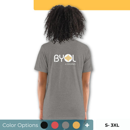 Back view of a woman wearing a gray BYOL mindset t-shirt with color options in black, red, pink, gray, and yellow, available in sizes S to 3XL.