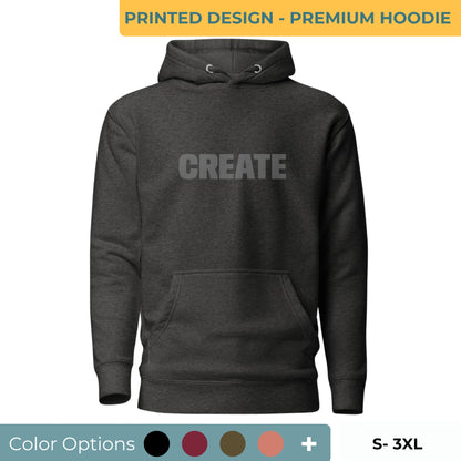 Charcoal heather gray "Create" printed premium hoodie with front pouch pocket, adjustable drawstrings, and soft fleece lining, available in multiple colors and sizes.