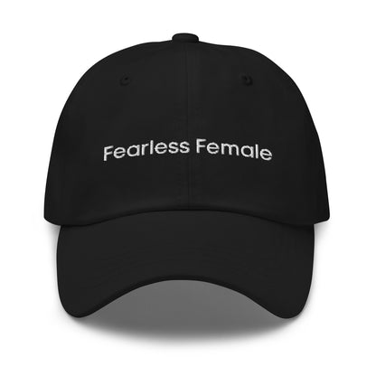 A black dad hat with the phrase "Fearless Female" embroidered in white stitching across the front.