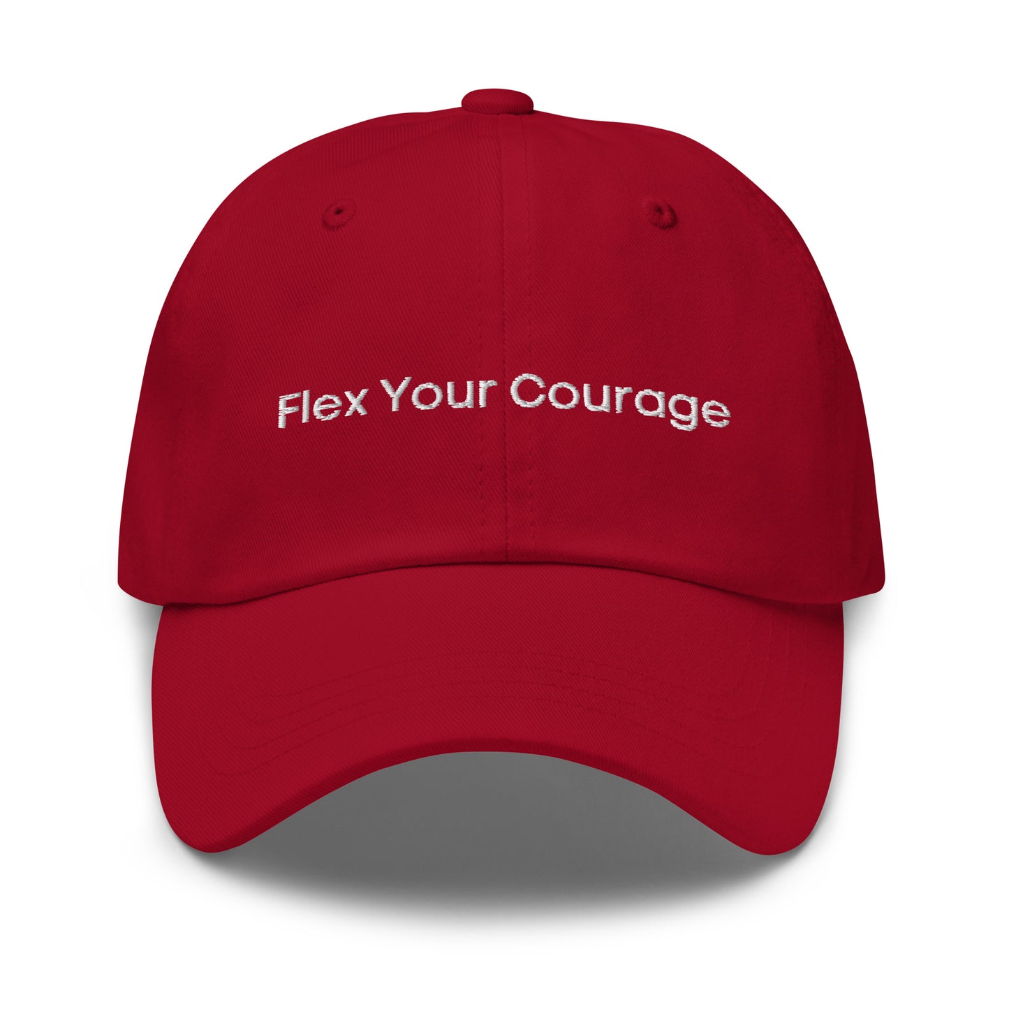 A red dad hat with the phrase "Flex Your Courage" embroidered in white stitching across the front.