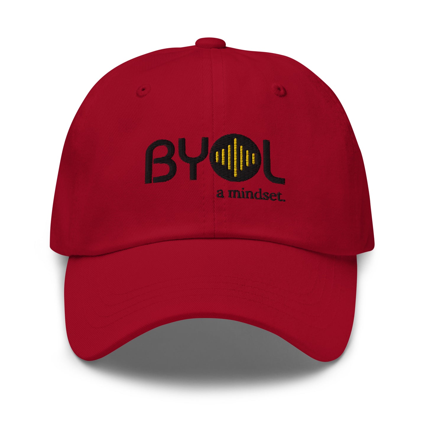 Red classic dad hat with "BYOL a mindset" embroidered on the front in black and yellow, displayed against a clean background. Available in various colors: black, gray, green, pink, and white.