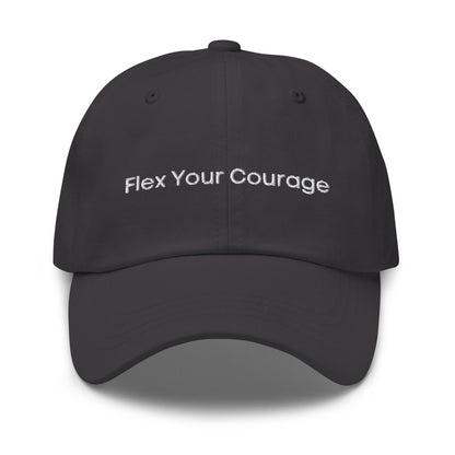 A dark grey dad hat with the phrase "Flex Your Courage" embroidered in white stitching across the front.