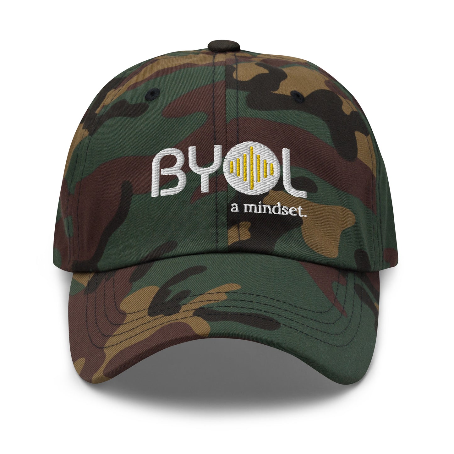 Camo classic dad hat with "BYOL a mindset" embroidered on the front in white and yellow, displayed against a clean background. Available in various colors: black, gray, green, pink, and tan.