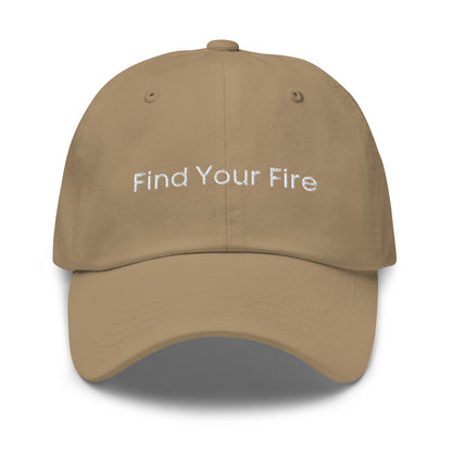 A khaki dad hat with the phrase "Find Your Fire" embroidered in white stitching across the front.