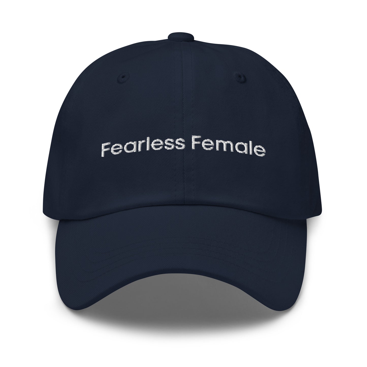 A dark blue dad hat with the phrase "Fearless Female" embroidered in white stitching across the front.