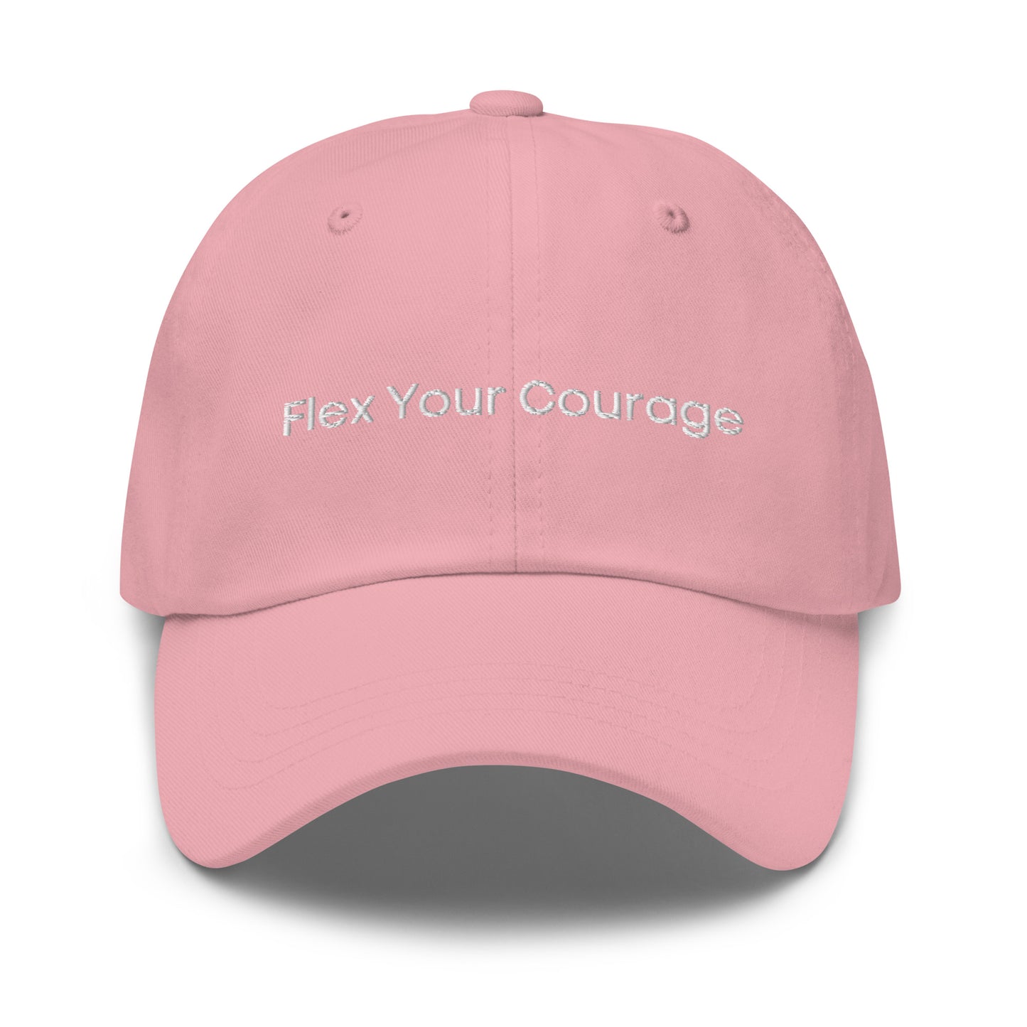 A pink dad hat with the phrase "Flex Your Courage" embroidered in white stitching across the front.