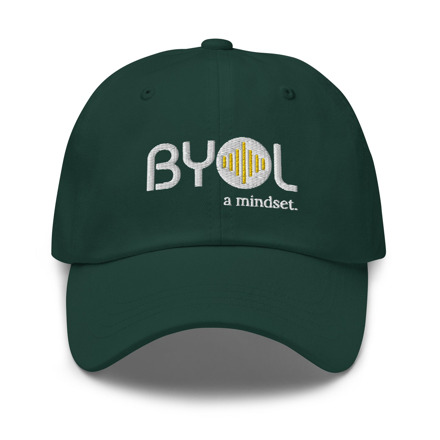 Green classic dad hat with "BYOL a mindset" embroidered on the front in white and yellow, displayed against a clean background. Available in various colors: black, gray, green, pink, and tan.