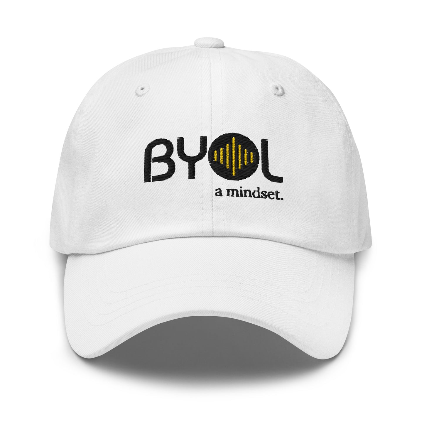 White classic dad hat with "BYOL a mindset" embroidered on the front in black and yellow, displayed against a clean background. Available in various colors: black, gray, green, pink, and white.