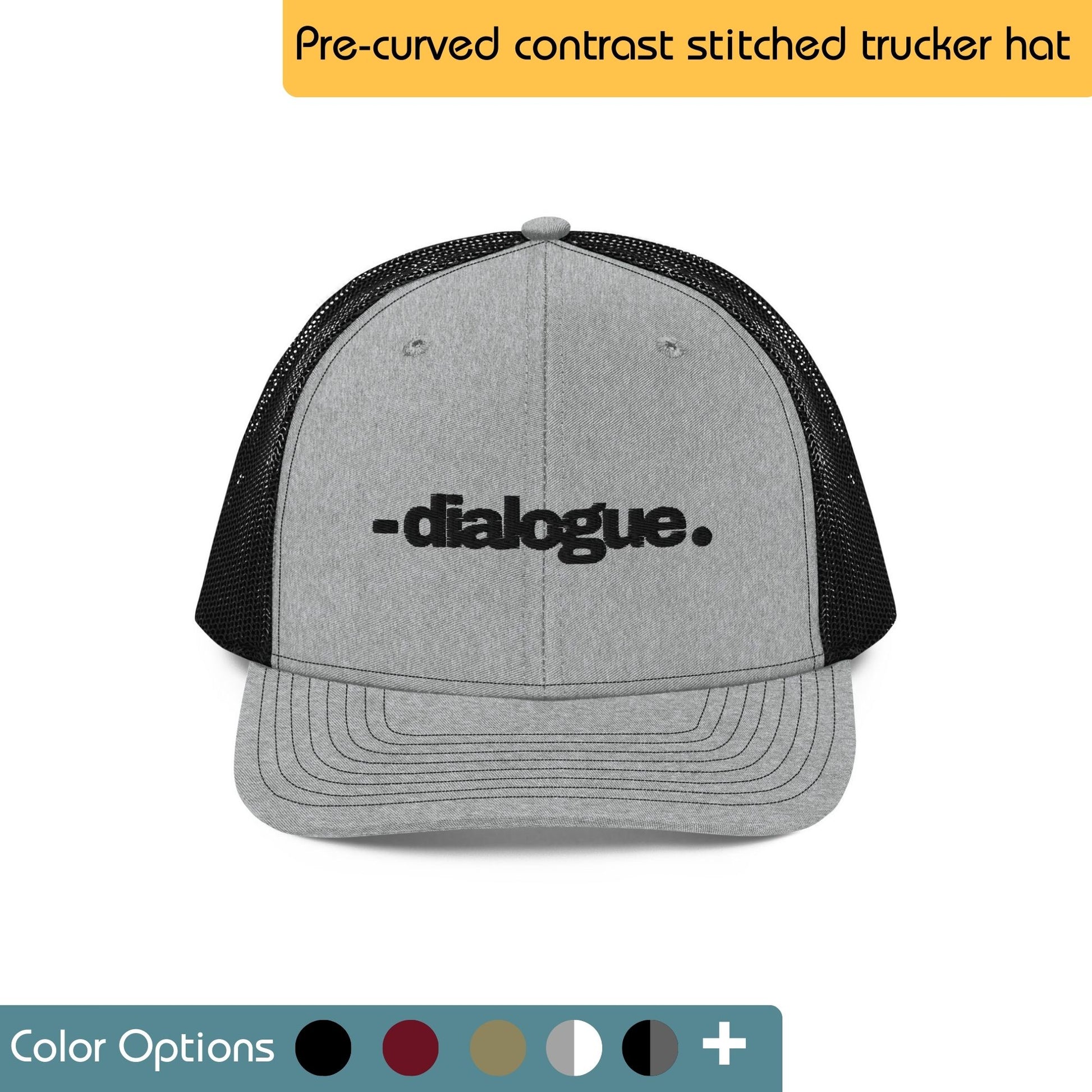 Pre-curved, brown trucker hat with contrasting stitching along the seams. The word "dialogue" is embroidered in white on the front of the hat. Text "Pre-curved contrast stitched trucker hat" is written above the image.