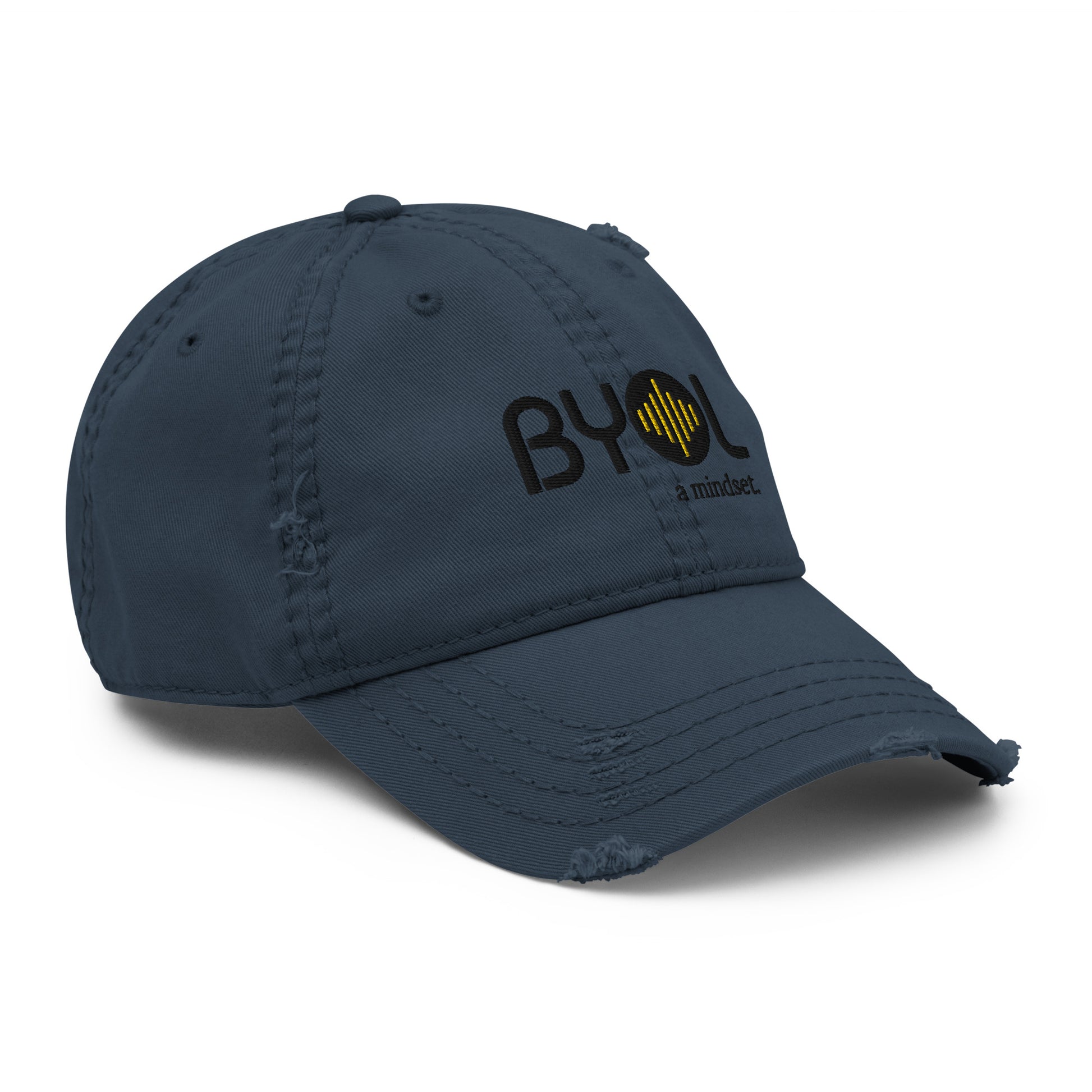 Navy blue distressed dad hat with "BYOL a mindset" embroidered on the front in black and yellow, featuring intentional wear and tear details, displayed against a clean background. Available in various colors: black, navy blue, gray, green, and beige.