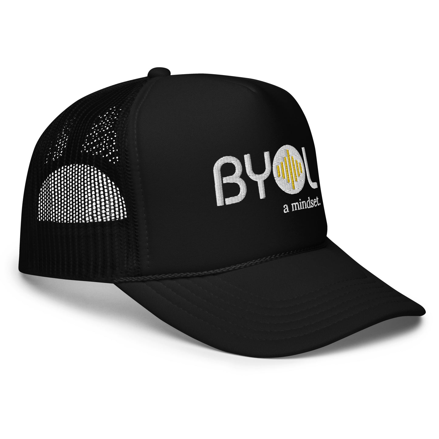 Black foam trucker hat with "BYOL a mindset" embroidered on the front in white and yellow displayed against a clean background. Available in various colors: black, white and blue, blue, pink, and white.